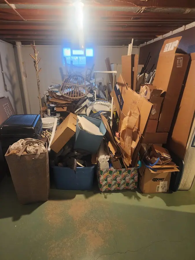 Roll-off dumpster container at job site for 8 Yard Dumpster Rental in Hampstead